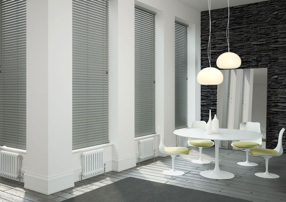 Silver long venetian blinds in a dining area