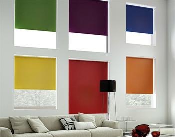 Multicoloured roller blinds in a white living room