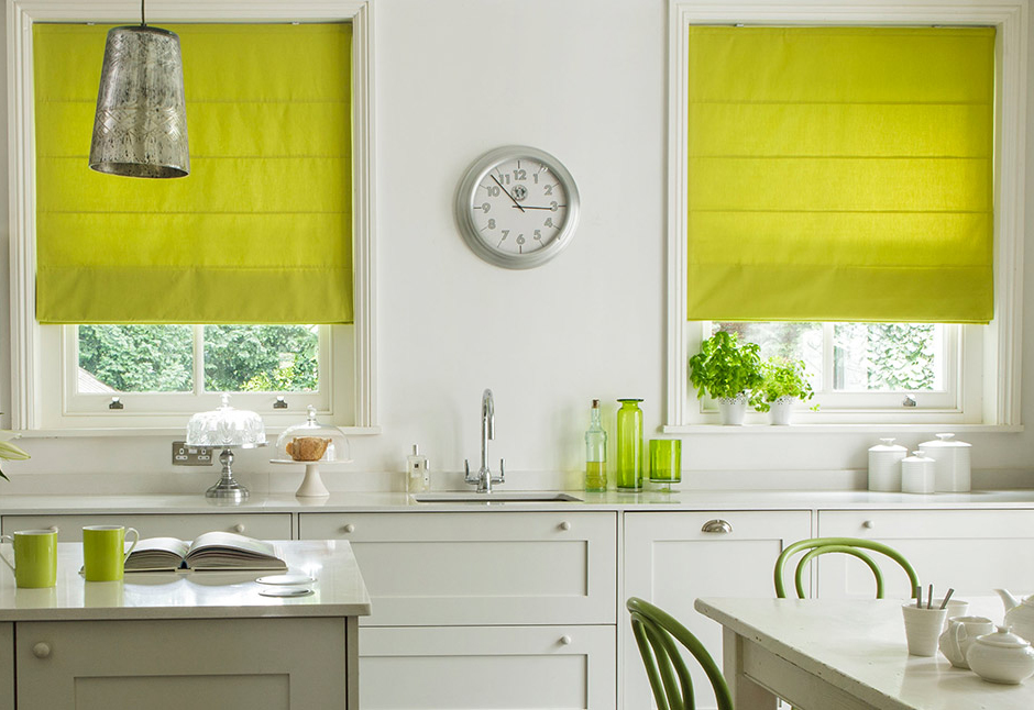 Bright lime green roman blinds in a white kitchen