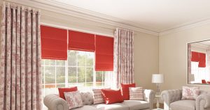 Coral roman blinds in living room