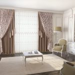 Dramatic curtains and blinds fittings in a glamorous living room. Large rug with a coffee table in the centre and light coming in to the room.
